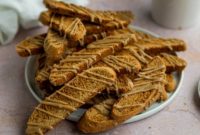 Gingerbread Biscotti with a Frosty Crunch