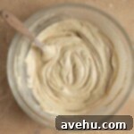 Decadent Triple Caramel Cake 4 Caramel cake batter in a glass bowl.