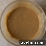 Easy Moist Coffee Cupcakes 4 Finished coffee cupcake batter in a glass bowl.