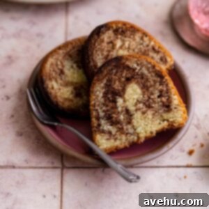 Effortless Marble Bundt Cake from a Single Batter 2 Three slices of marble bundt cake on a pink plate.