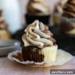 Easy and Moist One Bowl Wonder Marble Cupcakes 2 A marble cupcake with it's liner peeled down.