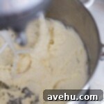 Easy and Moist One Bowl Wonder Marble Cupcakes 10 Vanilla frosting in a bowl.