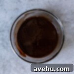 Decadent Banana Fudge Brownies 3 Melted chocolate and butter in bowl.