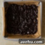 Ultimate Banana Bread Brownies 6 A pan lined with brownie batter.