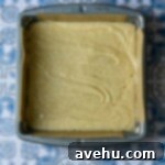 Irresistible White Chocolate Blondies 6 White chocolate brownie batter in a brownie pan.