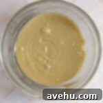 Simple Chocolate Chip Cookies No Brown Sugar Required 4 Cookie dough batter without the chocolate chips in a glass bowl.