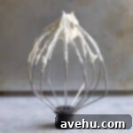 Simple Fudgy Black Forest Brownies 6 A beater with stiff peaks of whipped cream.