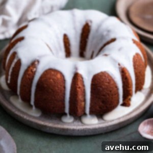A bundt cake topped with a maple drizzle glaze.