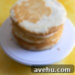 Velvet Zest Lemon Curd Cake 14 A lemon cake filled and stacked with lemon curd filling.