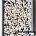 The Easiest Mississippi Mud Cake From Scratch 5 Toasted mini marshmallows on top of chocolate cake in a 9x13 pan.