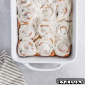 Spirited Cherry Cinnamon Buns 2 Bourbon Soaked Cherry Cinnamon Buns! Classic cinnamon buns with a nice southern twist. #cinnamonbuns #bourbon #bourbonsoakedcherries #buns frostingandfettuccine.com
