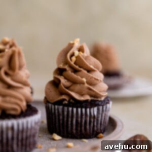 Indulgent Nutella Cupcakes Made Simple 2 A Nutella cupcake on a brown plate.