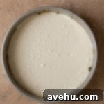 Velvet Apple Pie Cheesecake 5 Cheesecake batter in a springform pan.