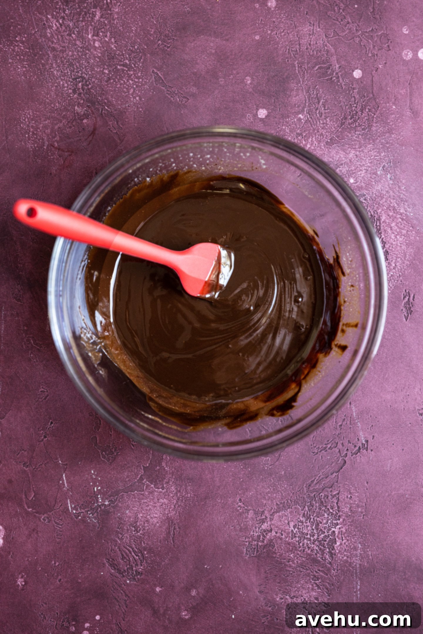 Velvet Chocolate Mousse Cake No Gelatin Needed 5 Melted chocolate and butter in a bowl.