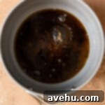 Silky Smooth Cookie Dough Frosting 12 Brown sugar and water combined in a pan.