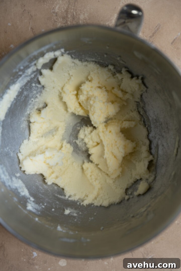 Easy Surprise Cookie Dough Cupcakes 6 Creamed butter and sugar in a mixing bowl.
