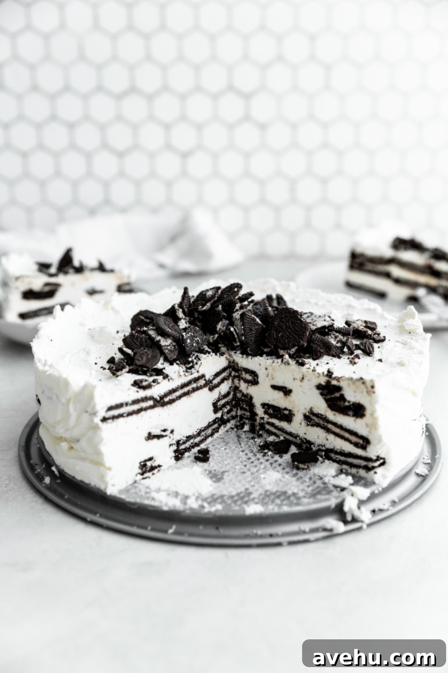 No-Bake 4-Ingredient Chocolate Dream 3 A chocolate icebox cake with a couple slices taken out.