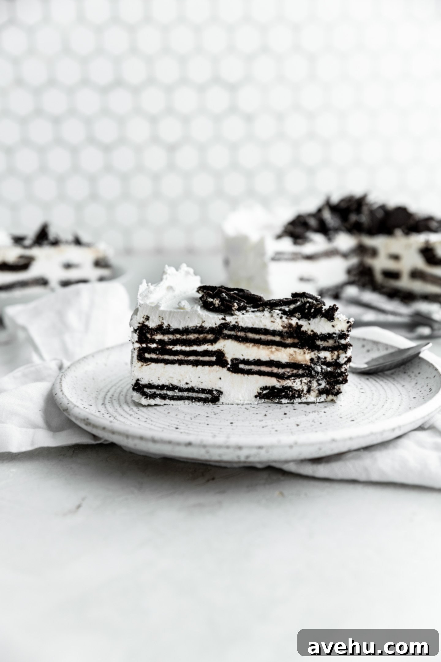 No-Bake 4-Ingredient Chocolate Dream 10 A piece of a chocolate ice box cake on a plate.