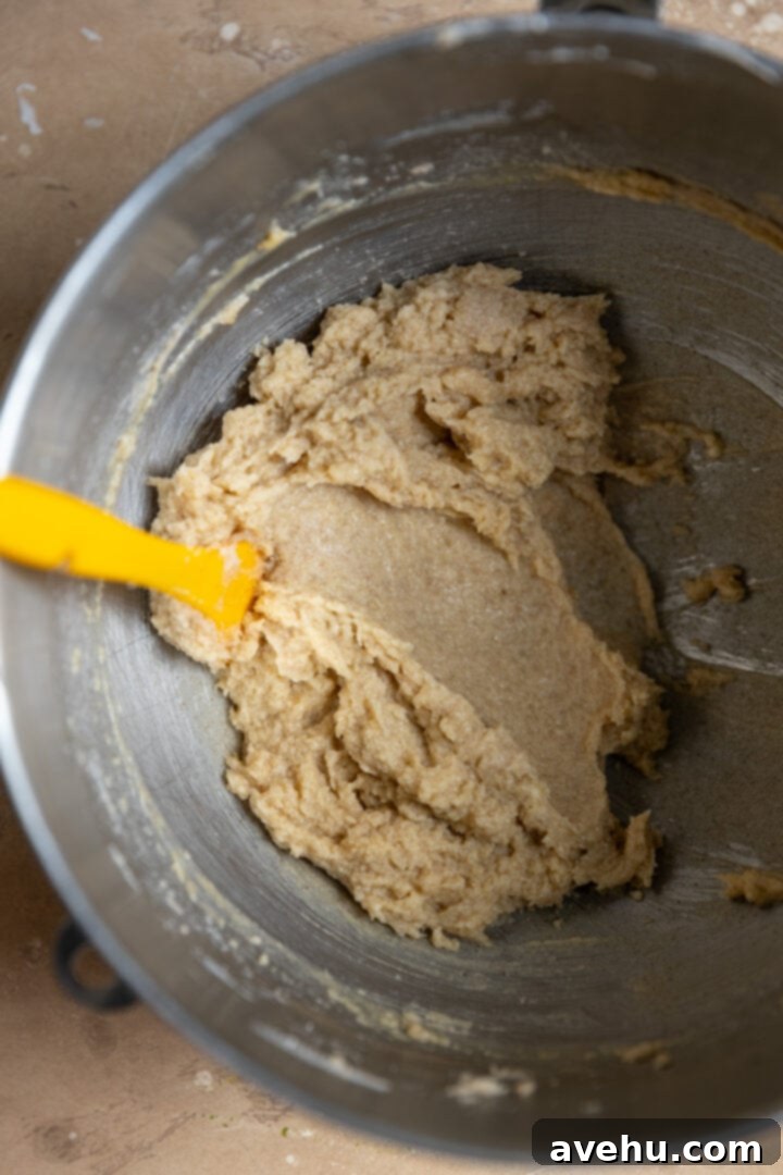 Cinnamon Sugar Chews in Minutes 3 Creamed butter, sugar, and cinnamon in a mixing bowl, showing a light and fluffy texture.