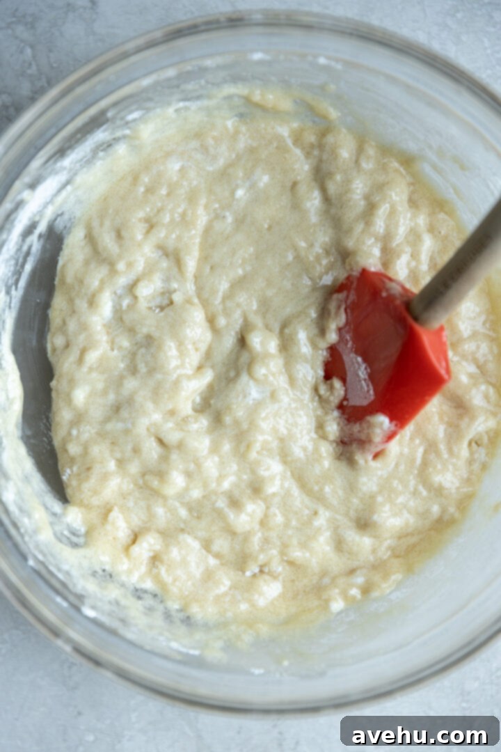 Classic Soft & Moist Muffins 5 Basic muffin batter in a glass mixing bowl.