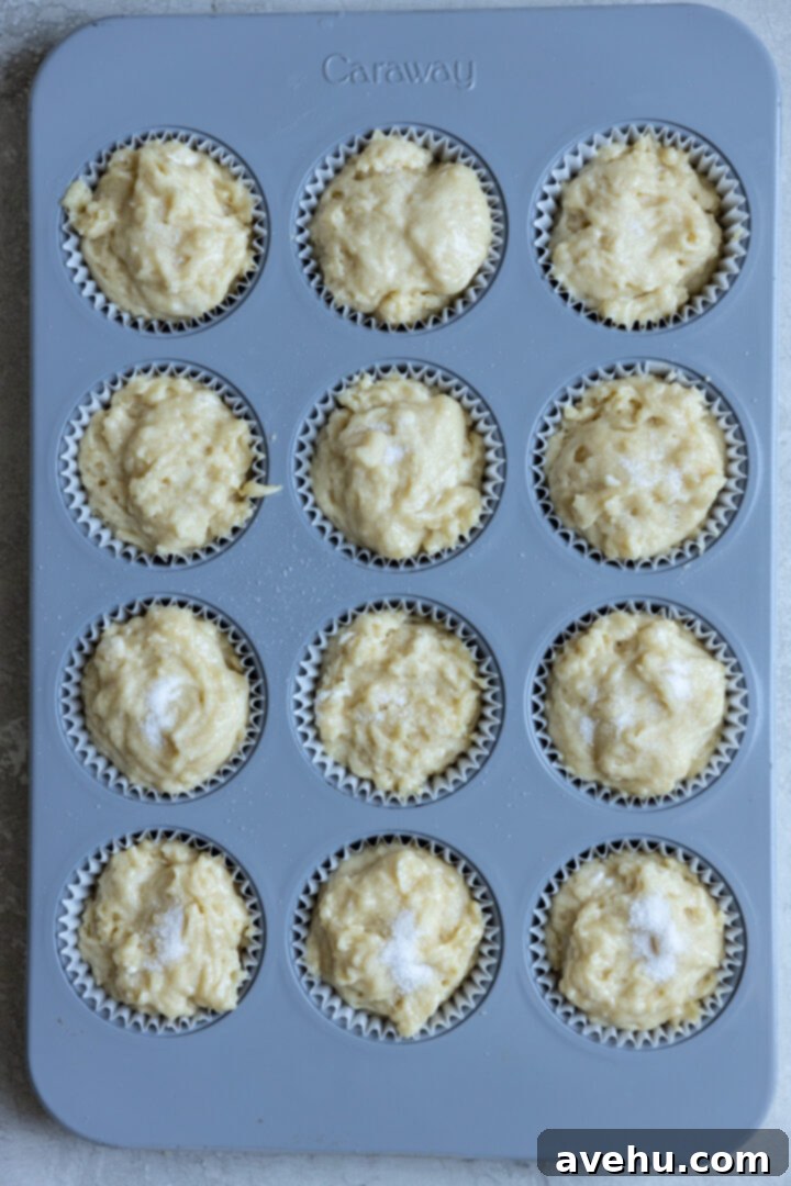 Classic Soft & Moist Muffins 6 Muffin batter in a muffin tin.