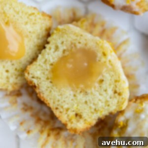 Pillowy Lemon Curd Muffins 14 A lemon curd muffin split down the middle
