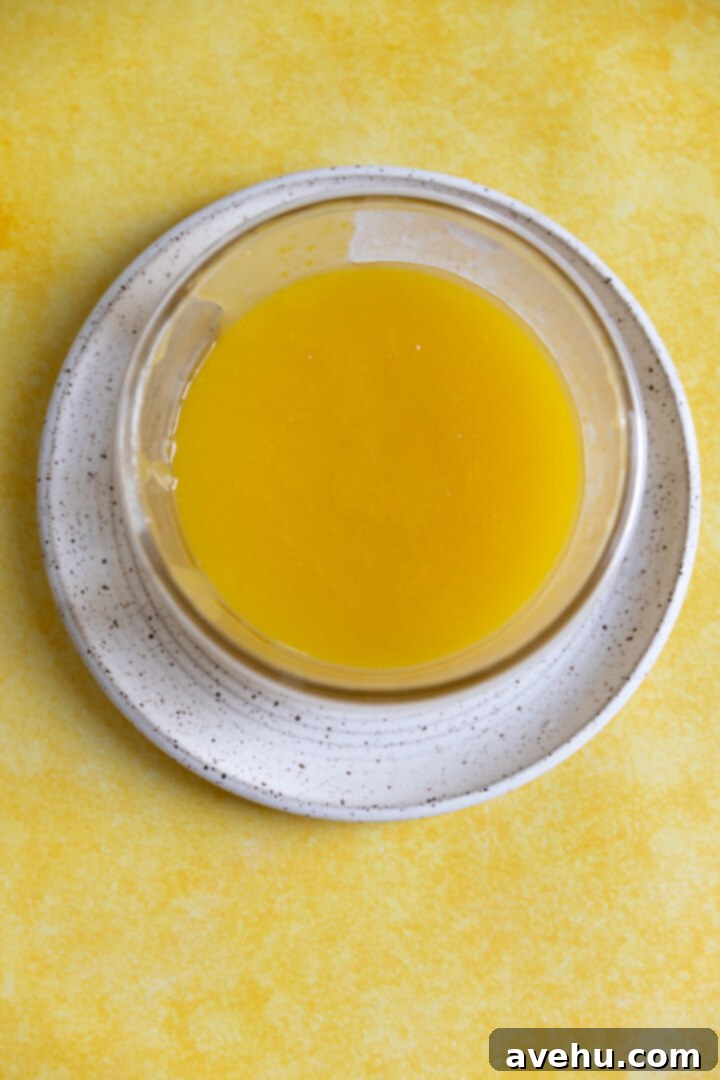 Pillowy Lemon Curd Muffins 8 Homemade lemon curd in a glass bowl.