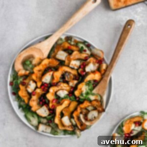 Autumn's Rustic Panzanella with Balsamic Drizzle 2 A fall panzanella salad styled on a grey background and about to be served.