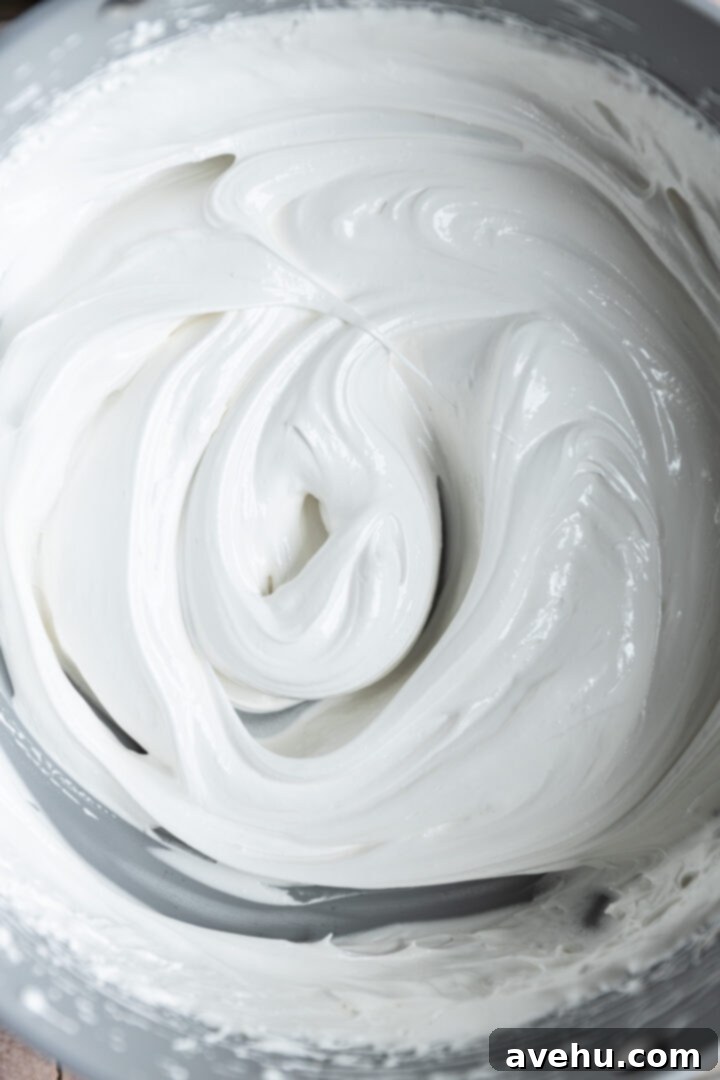 Effortless 7-Minute Frosting 8 Finished 7 minute frosting in a pot after vanilla has been mixed in.