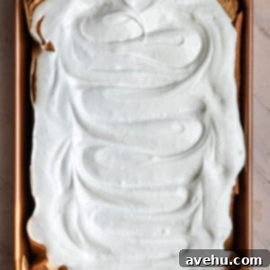 Effortless 7-Minute Frosting 9 7 minute frosting spread over a vanilla sheet cake.