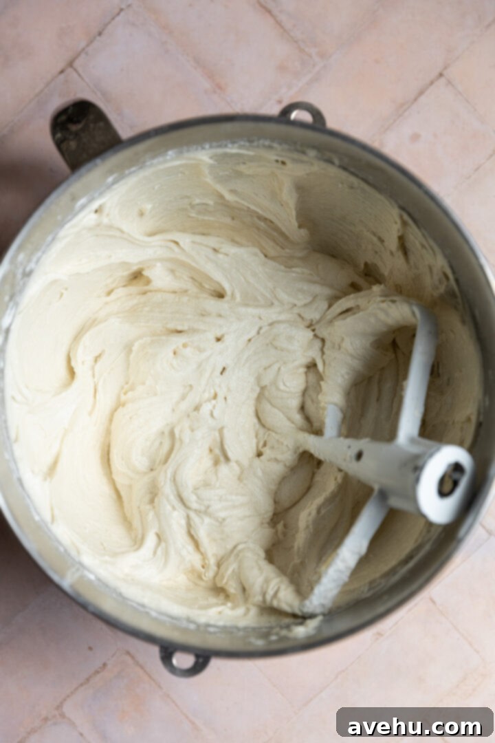 The Ultimate Vanilla Sheet Cake 7 Vanilla sheet cake batter in a mixing bowl.