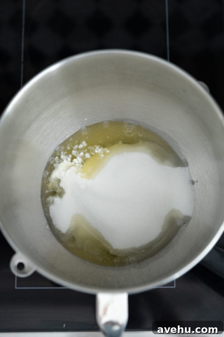 Seriously Addictive Swiss Meringue Buttercream 10 Egg whites, sugar, and cornstarch in a mixing bowl.