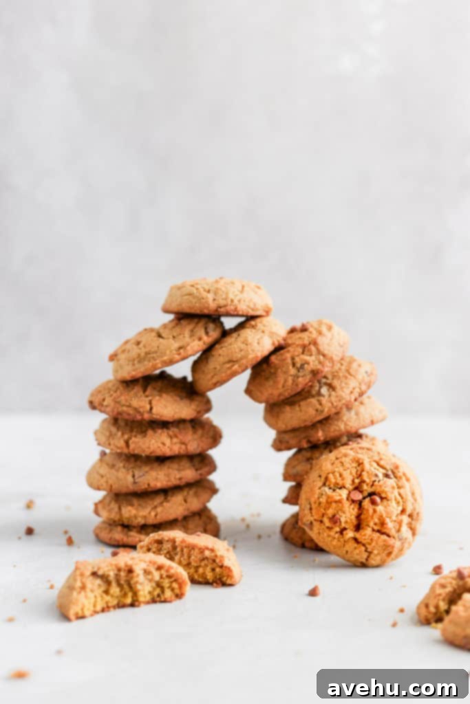 Chewy Pumpkin Maple Spice Cookies 5 Stack of pumpkin maple caramel chip cookies, perfectly baked and golden.