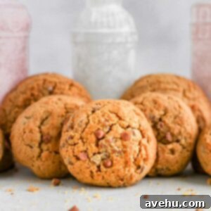 Chewy Pumpkin Maple Spice Cookies 8 Chewy pumpkin maple cookies with caramel chips, perfect for fall or holiday baking.