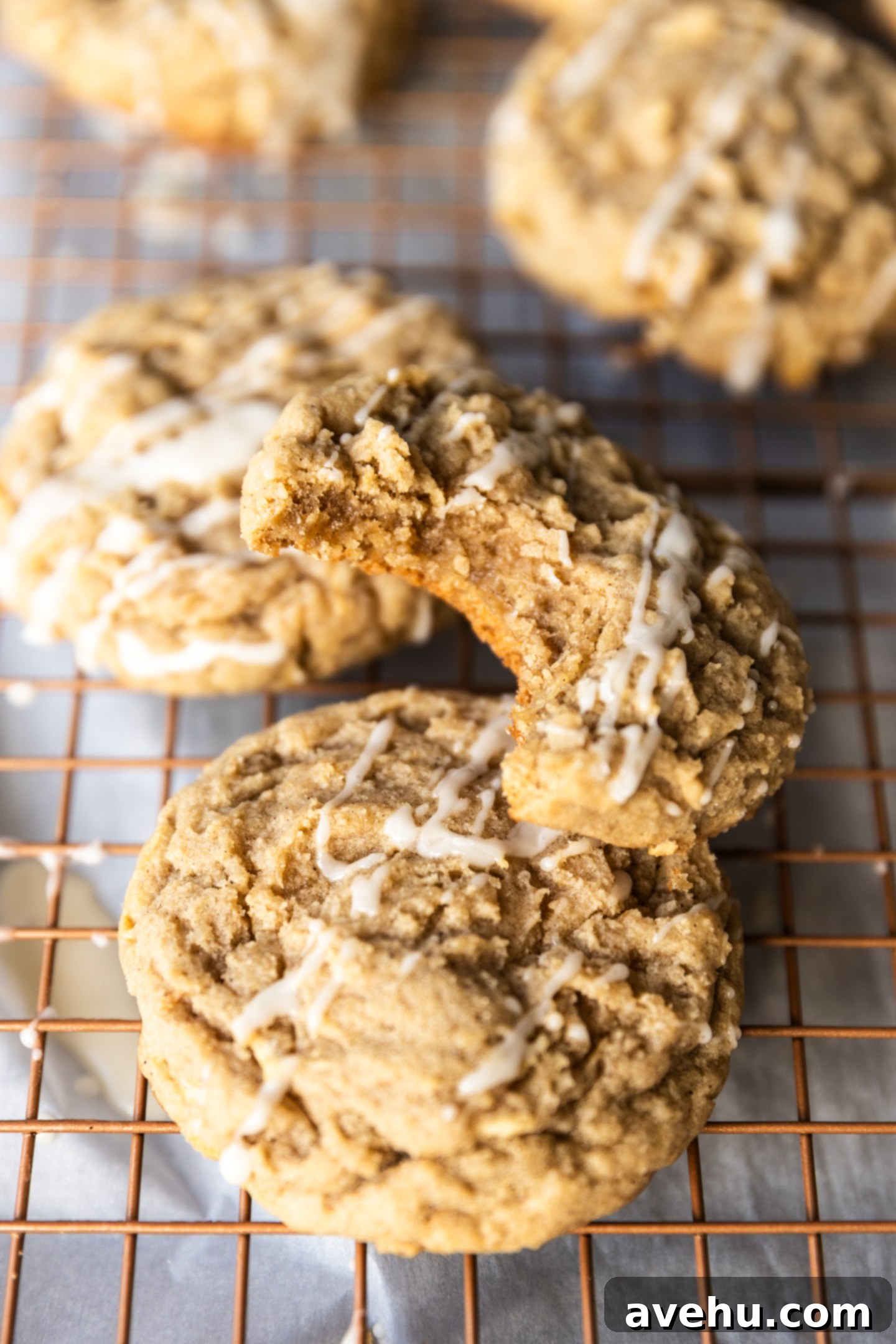 Maple-Glazed Autumn Apple Bites 8 An apple cookie with a bite taken out of it.