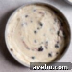 Effortless and Perfectly Moist Blackberry Cake 12 white cake batter in a cake pan