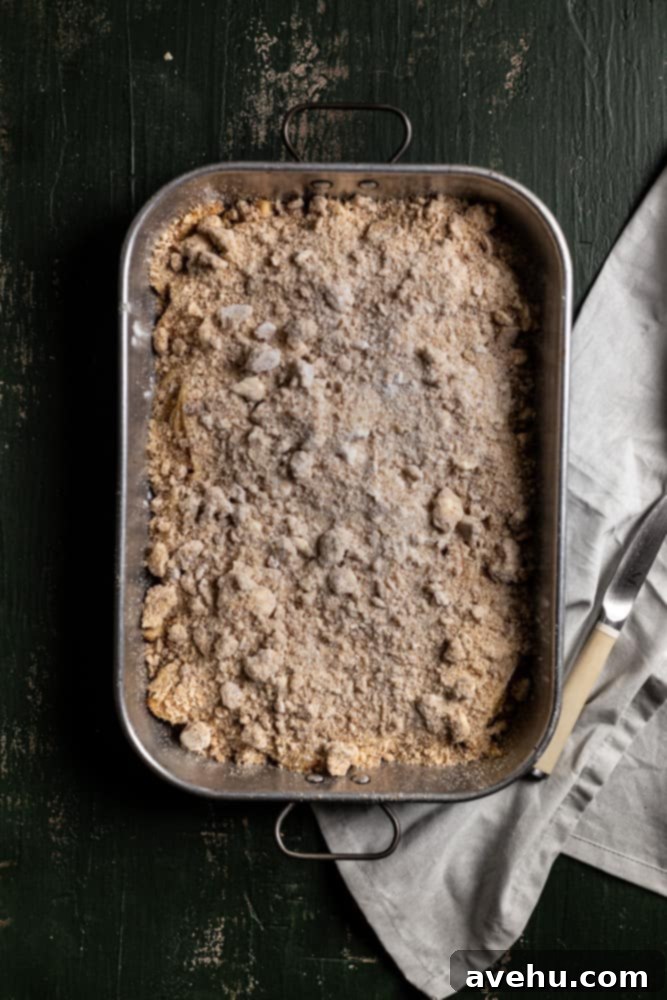 Generous 9x13 Apple Pie Bars 7 Crumb topping generously sprinkled over the apple pie bars before baking