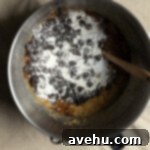 Chocolate Banana Velvet Dream 6 Flour and chocolate chips added to a batter for chocolate banana cake, before the final mixing.