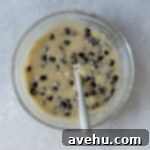 Irresistible Gooey One Bowl Blondie Cookies 9 Blondie batter with chocolate chips in a glass bowl.