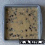 Irresistible Gooey One Bowl Blondie Cookies 10 Blondie batter in a metal pan.