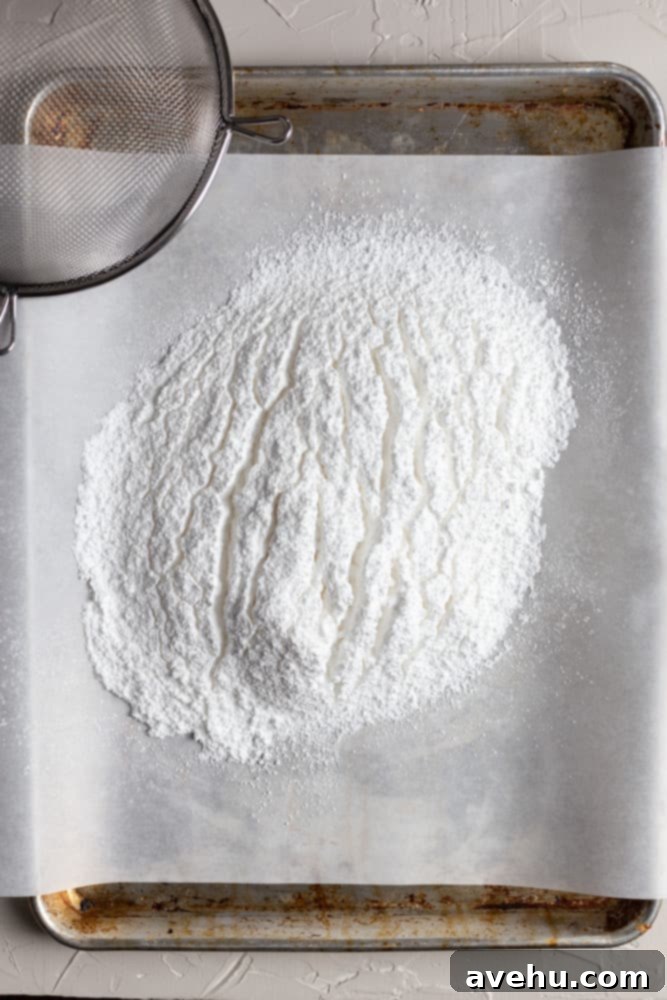 Quick Coffee Buttercream in 5 Minutes 4 Confectioners sugar softed on parchment paper