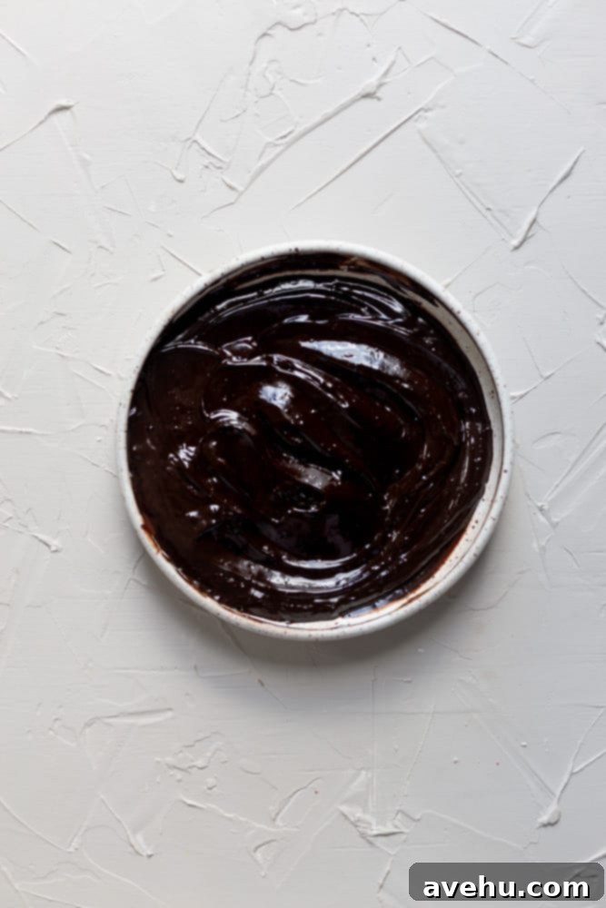 Quick Strawberry Fudge Brownies 8 Smooth and glossy chocolate ganache in a white bowl, perfectly emulsified and ready to be spread onto brownies