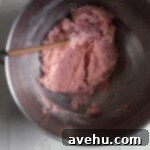 Decadent Strawberry Chewies 5 Mixture of butter, sugar, and freeze dried strawberries in a bowl