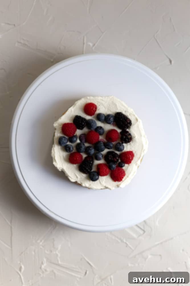 Lush Berry Chantilly Layers 7 A cake layer topped with mascarpone chantilly cream and fresh berries