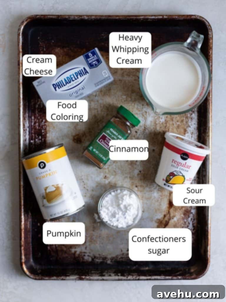 Simple Creamy Pumpkin Mousse Egg Free 3 A flat lay image showing all the ingredients for pumpkin mousse laid out on a dark surface.