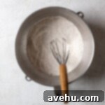 Irresistibly Fluffy Espresso Cupcakes 3 Dry ingredients whisked together in a stainless steel mixing bowl