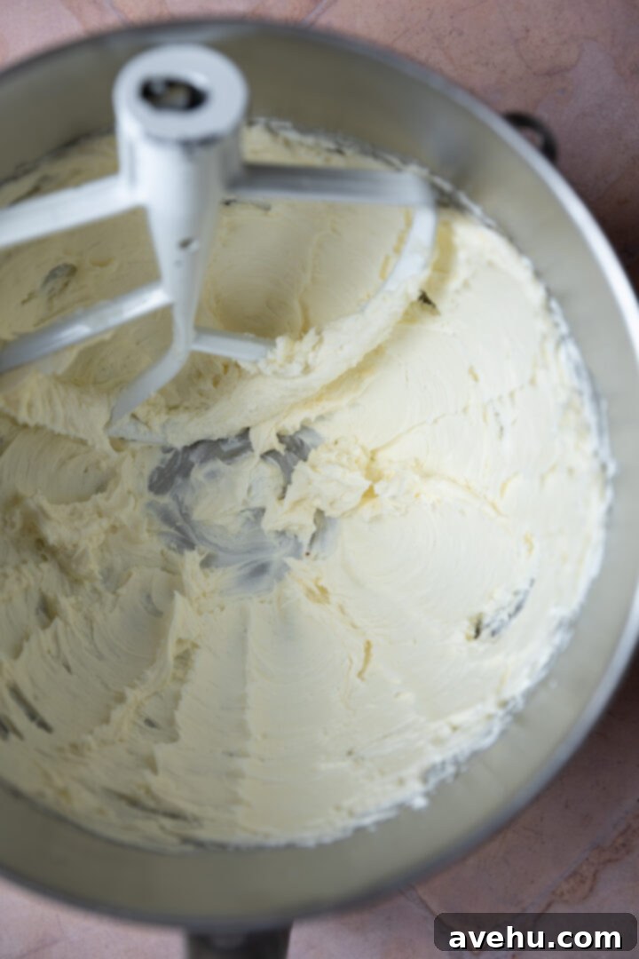 Effortless Pipeable Cream Cheese Frosting 4 Creamed butter and cream cheese in a mixing bowl, smooth and combined.