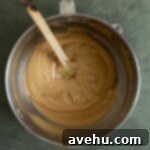 Deliciously Simple Gingerbread Bundt 6 Gingerbread bundt cake batter in a mixing bowl.