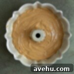 Deliciously Simple Gingerbread Bundt 7 Gingerbread cake batter in a bundt pan.