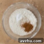 Dry ingredients in a glass bowl.